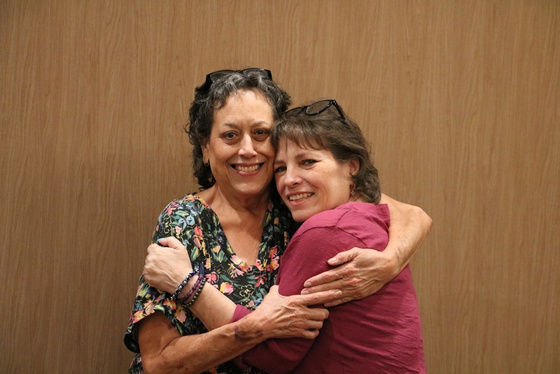 Two people hugging
